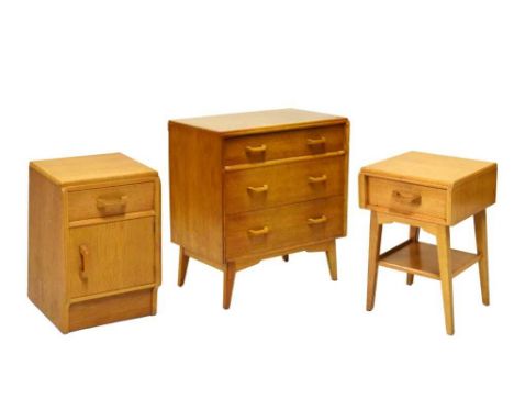 E Gomme G-Plan "Brandon" Mid-Century light oak part bedroom suite, circa 1955, comprising chest of three drawers; bedside tab