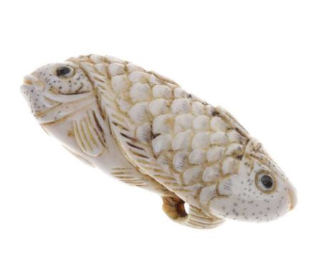 Japanese carved ivory double carp netsuke, the two fish opposed, with realistic scale details, remnants of signature beside c