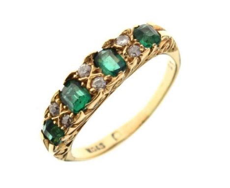 Green doublet and diamond ring, with polished out hallmark, the graduated step cut stones with pairs of old single cuts betwe