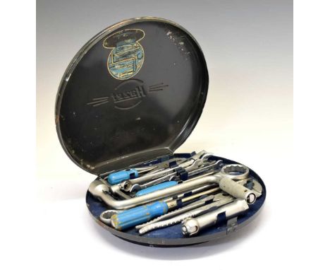 Vintage circular Hazet Tourist toolkit for a Porsche to include; spanner, screwdrivers, pliers etc. 27cm x 29.5cm. Condition 