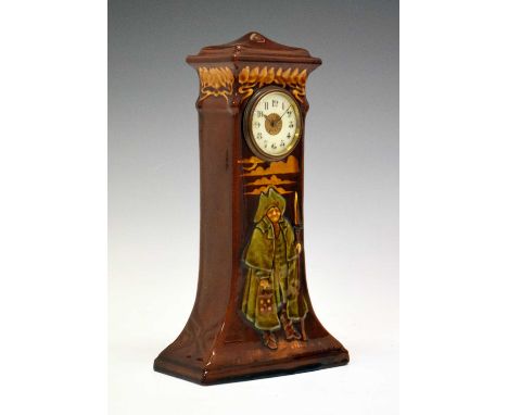 Rare Doulton Kingsware pottery clock, designed by Charles Noke, moulded and decorated in the Night Watchman pattern, the move