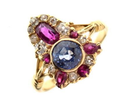 Edwardian sapphire, ruby and diamond 18ct gold ring, London 1908, the round cut sapphire with an oval cut ruby above enclosed