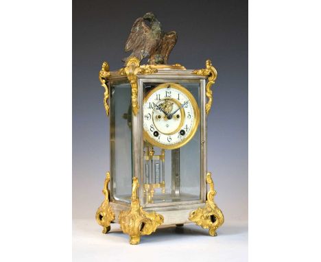 Ansonia American silvered and gilt four-glass mantel clock, with cream Arabic chapter ring framing partially expose Brocot es