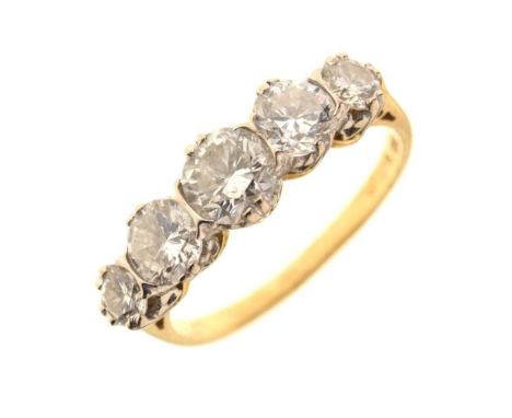 Five stone diamond 18ct gold ring, London 1994, the graduated brilliant cuts totalling approx 1.9cts estimated, size P½, 3.8g