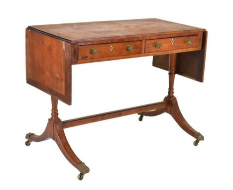 Early 19th century ebony inlaid satinwood sofa table, the top crossbanded with rosewood, two frieze drawers with ivory escutc