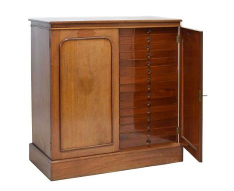 Victorian mahogany floor-standing collectors cabinet, double doors enclosing thirty slide drawers in two banks, each with rin