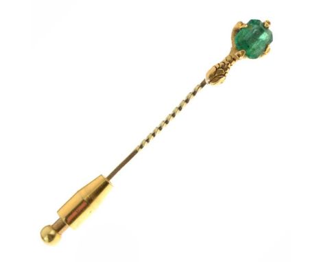 Emerald stickpin, the step cut stone to a talon claw settingCondition report: General condition consistent with age and use. 