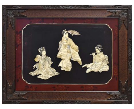 Japanese late Meiji period study of a biji dancer and two musicians, bone, ivory and mother of pearl reserved on a lacquered 