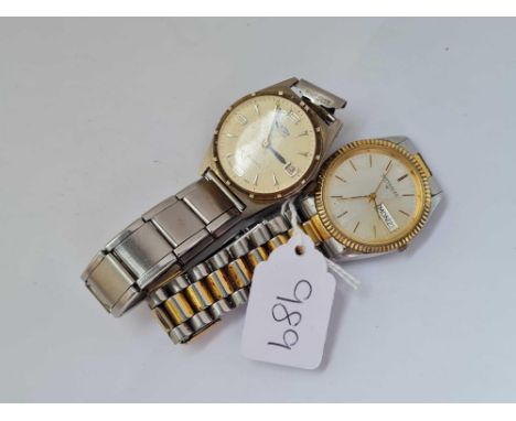 two gents wrist watches one by Montor with seconds and calendar aperture dial and one by Wittnauer with seconds sweep and cal