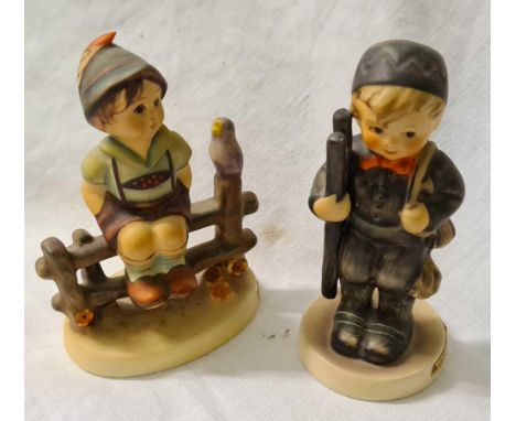 Two Hummel figures of boys 