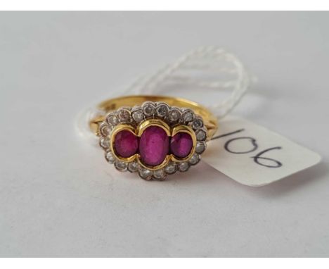 A ruby and diamond cluster ring 18ct gold size K - 4.3 gms