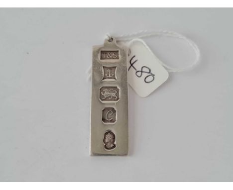 A sterling silver ingot pendant 