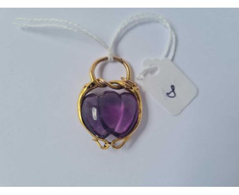 A gold framed amethyst heart pendant 7.8g