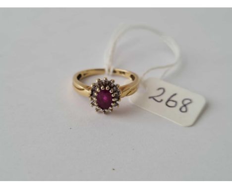 A 9ct ruby and diamond cluster ring size L - 2.5 gms 