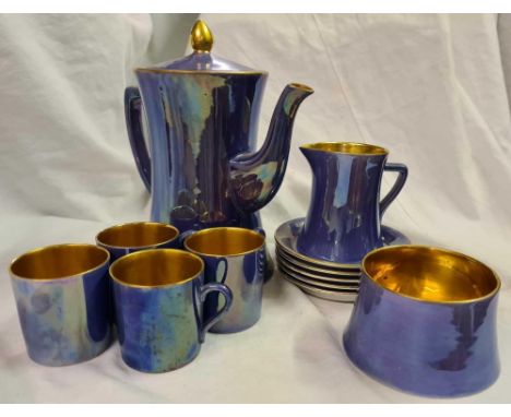 A blue and gilt bordered Carlton ware coffee set with 4 coffee cups 5 saucers etc. 