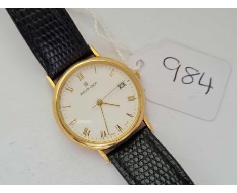 A gents wrist watch by Bueche Girod with seconds sweep and calander aperture in 9ct 