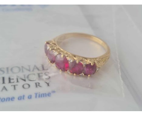 VICTORIAN 5 STONE RUBY CARVED HALF HOOP RING (APPROX RUBY WEIGHT 2.25CTS ) WITH DIAMOND POINTS TOGETHER WITH A CERT FROM CART