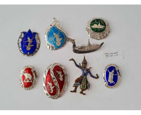 Eight silver and enamel brooches - 51 gms 