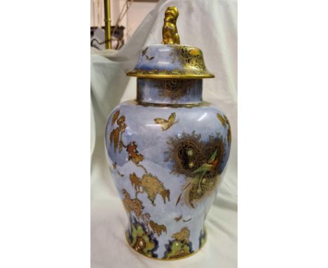 A large Carlton ware jar and cover decorated with birds and exotic plants 14 inches high 