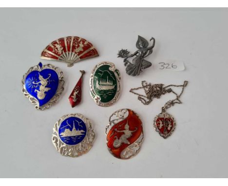 Eight silver and enamel brooches -  53 gms 