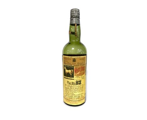 WHITE HORSE SPRING CAPBlended Scotch Whisky. Pre-1952 bottling. Bottle no. 1456052. No capacity or strength stated.    CONDIT