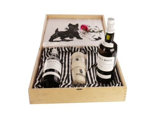 BLACK & WHITE SPRING CAP TWIN PACK WITH GLASSESBlended Scotch Whisky. Neck labels read: 'By appointment to Her Majesty The Qu