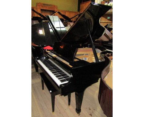 Kawai (c1980)
A 6ft 1in Model KG-3C grand piano in an ebonised case on square tapered legs, together with a matching stool.