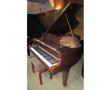 Kawai (c1971) 
A 5ft 10in Model KG-2C grand piano in a bright mahogany case on square tapered legs, together with a stool.