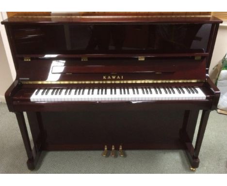 Kawai (c2011)
A Model K3 upright piano in a traditional style bright mahogany case, together with a matching brown-top stool.