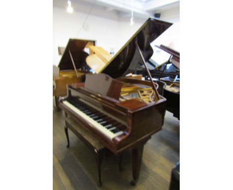 Blüthner (c1933)  
A 4ft 11in grand piano in a fiddleback mahogany case on square tapered legs, together with a duet stool. T