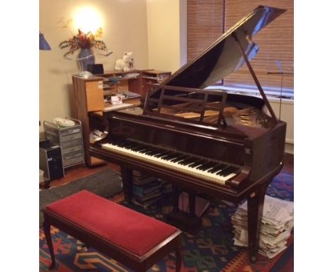 Blüthner (c1924)
A 6ft 3in grand piano in a rosewood case together with a red upholstered duet stool. 
