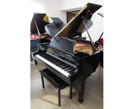 Samick (c2010) 
A 4ft 8in Model SIG-48 grand piano in a bright ebonised case on square tapered legs, together with a matching