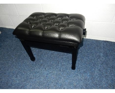 Piano Stool 
A concert adjustable piano stool in a bright ebonised finish with buttoned leather top.
