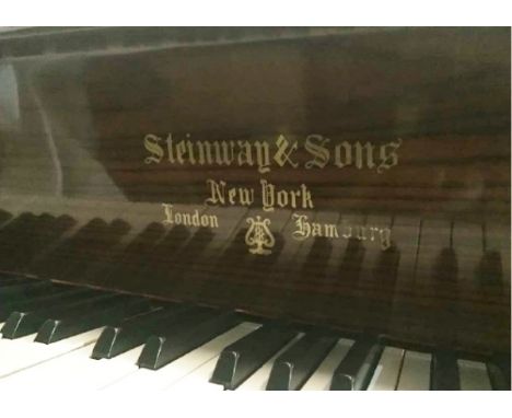 Steinway (c2003) 
A 6ft Model L grand piano in a satin mahogany case on square tapered legs.  AMENDMENT.  Is the 150 Years An
