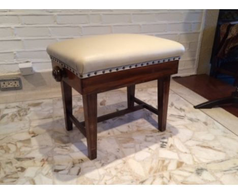 Piano Stool
A concert adjustable mahogany piano stool with a leather top.