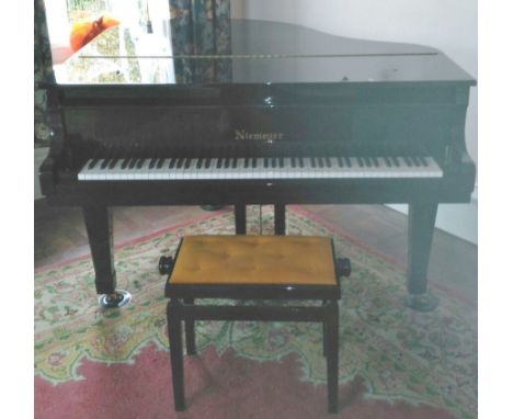Niemeyer (c2000) 
A ‘baby’ grand piano in a bright ebonised case on square tapered legs together with a stool. 