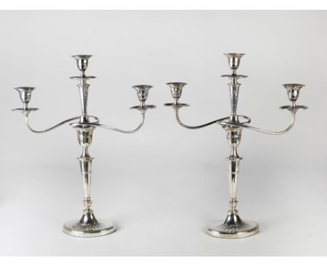 A very elegant pair of late Victorian Sheffield silver three light Candelabra, of oval shape, with reeded decoration, and wit