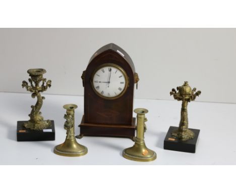 A Regency period inlaid dome shaped mahogany Mantle Clock, with enamel dial and works by Jacksons Rumford, with lion mask dro