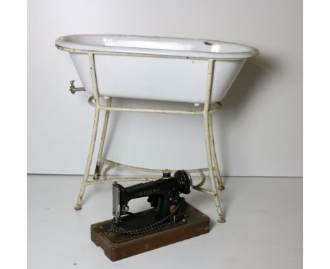 A Singer Table Sewing Machine, also a smaller ditto, an unusual enamel Child's Bath with tap outlet, on original stand, and a