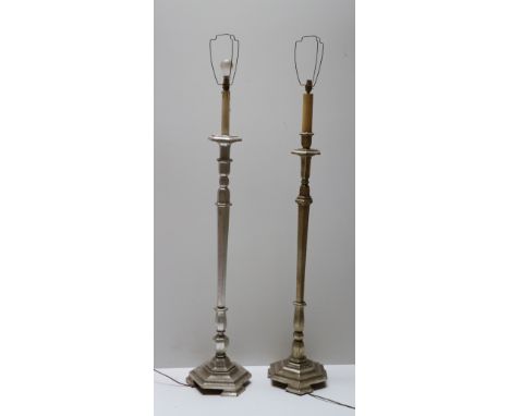 An almost matching pair of silvered wooden Lamp Standards, on hexagonal bases. (2)