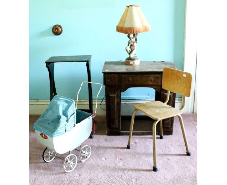 A Children's kneehole Desk, a chair, a part lacquered table rest, a painted towel rail, and a small table lamp modelled as a 