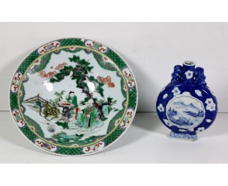 A circular Chinese Famille Verte porcelain stemmed Bowl, decorated with figures and a deer, 28cms (11"); together with a smal