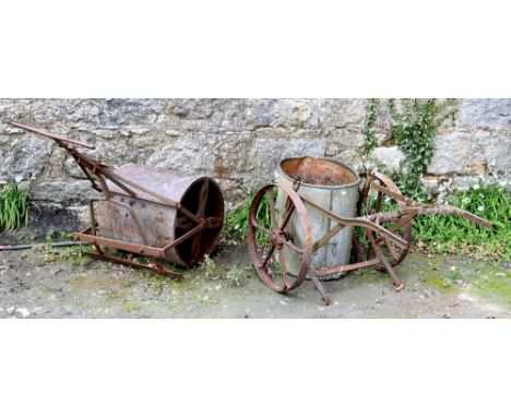 A Victorian period cast iron Garden Roller, together with a Water Carrier. (2)