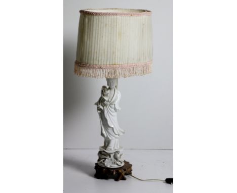 A 19th blanc-de-chine Figure, of an Oriental Lady on a wooden base, now converted to a Lamp. (1)