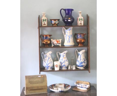 Porcelain: A Mayers Dalehall pottery Jug, the blue ground with cream decorative overlay, three blue and white matching Jugs o