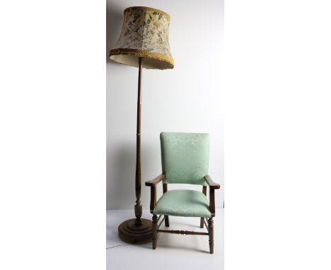 A wooden Lamp Standard, with floral shade, an oak framed upholstered Open Armchair, a blue Table Lamp and shade and an electr