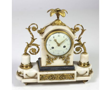 A very attractive French 19th Century Neo-classical ormolu mounted white marble Mantle Clock, the arched top with a leaf cast