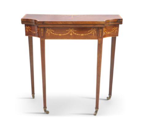 A SHERATON STYLE SATINWOOD INLAID MAHOGANY FOLDOVER CARD TABLE, LATE 19TH CENTURY, the inlaid top with inverted concave corne