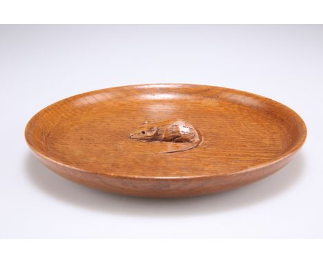 ROBERT THOMPSON, A MOUSEMAN OAK BOWL, shallow circular form, carved mouse signature to the centre. 17cm diameterCONDITION REP