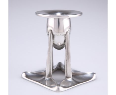 ARCHIBALD KNOX (1864-1933), A LIBERTY &amp; CO TUDRIC PEWTER CANDLESTICK, no. 0222, the bullet-shaped candlecup raised on fou